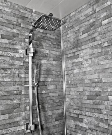 Add a striking 3D texture and contemporary charm to your interiors with Slate Brick 3D Wet Wall Panels 3 Sided Kit. Measuring 1 meter by 2.4 meters with a 10mm thickness, these panels replicate the authentic look and feel of slate bricks in a modern 3D design. Unlike traditional brick or stone cladding, which can be heavy, labor-intensive, and costly, these panels are lightweight, waterproof, and simple to install, delivering a visually captivating slate brick effect with minimal effort. Why Choose Slate Brick 3D Wet Wall Panels? Realistic 3D Slate Brick Finish These panels feature a true-to-life 3D slate brick design with detailed texture, shadows, and natural variations. The layered effect creates depth and dimension, giving interiors a sophisticated and modern aesthetic. Durable and Long-Lasting Manufactured from premium materials, the panels are scratch-resistant, impact-resistant, and waterproof. Their 3D slate brick surface maintains its appearance over time, even in wet or high-traffic areas, ensuring long-lasting beauty. Lightweight and Easy to Install Traditional brick or stone cladding is heavy and requires professional installation. These panels are lightweight and DIY-friendly. The 3-sided kit ensures seamless coverage, making it quick and easy to achieve a professional 3D effect. Waterproof and Low Maintenance Ideal for bathrooms, kitchens, and commercial wet areas, the panels are fully waterproof and resistant to mold and mildew. Cleaning is effortless—simply wipe with a damp cloth to maintain the 3D slate brick look. Eco-Friendly and Safe Made from non-toxic, environmentally friendly materials, these panels are a sustainable alternative to natural brick or stone. Safe for indoor use, they combine durability, style, and practicality. Applications of Slate Brick 3D Wet Wall Panels These panels are versatile and suitable for a variety of spaces: Bathrooms: Perfect for shower walls, vanities, and bathtub surrounds, offering a textured, 3D slate brick aesthetic. Kitchens & Wet Areas: Ideal for backsplashes, feature walls, and wet zones, adding a modern brick effect without grout or messy installation. Commercial Spaces: Enhance hotels, restaurants, gyms, offices, and spas with a professional 3D brick appearance. Feature Walls: Create accent walls or highlight wet areas with the visual depth of 3D slate bricks. Ceilings & Partitions: Add a unique dimensional effect to partitions, ceilings, or decorative panels. Installation Guide Installing Slate Brick 3D Wet Wall Panels is quick and efficient: Prepare the Surface: Ensure walls are clean, dry, and smooth. Remove dust, grease, or previous finishes. Measure and Plan: Measure your wall accurately and mark panel placement for seamless alignment. Apply Adhesive: Spread high-quality waterproof wall adhesive evenly on the back of each panel. Place Panels: Press panels firmly against the wall, aligning edges precisely to achieve a seamless 3D slate brick effect. Secure Panels: Optional screws or nails can be used for additional stability, especially for vertical or high-traffic walls. Finishing Touches: Remove any excess adhesive and inspect alignment to ensure a professional, textured finish. Maintenance Tips Dust and wipe regularly with a soft cloth or microfiber duster. Clean spills promptly to preserve the 3D slate brick surface. Avoid abrasive tools or harsh chemicals that could damage the panels. Inspect edges periodically to ensure panels remain securely attached. Benefits Over Traditional Brick or Stone Cladding Feature Slate Brick 3D Wet Wall Panels Traditional Brick/Stone Cladding Installation Time 1-2 hours per wall Several days Weight Lightweight Very Heavy Cost Affordable Expensive Maintenance Low High Water Resistance High Medium DIY Friendly Yes Limited Design Inspiration Modern Bathrooms: Pair with matte black, chrome, or brushed steel fixtures to create a striking 3D textured wet area. Kitchens: Use as backsplash or feature wall to add depth, dimension, and a contemporary brick aesthetic. Commercial Interiors: Perfect for hotels, restaurants, gyms, and offices looking for a modern 3D brick design. Feature Walls: Highlight showers, vanities, or kitchens with visually dynamic 3D slate brick accents. Customer Reviews “These panels transformed our bathroom with a realistic 3D slate brick effect. Installation was fast and easy.” “Durable, waterproof, and low-maintenance. Perfect for kitchens and wet areas.” “Ideal for commercial wet areas. Unique 3D brick look and easy to install.” Conclusion The Slate Brick 3D Wet Wall Panels 3 Sided Kit (1m x 2.4m x 10mm) combines style, durability, and modern convenience. Offering the visual depth of 3D slate bricks without the weight, cost, or installation challenges of traditional cladding, these panels are perfect for residential bathrooms, kitchens, showers, and commercial wet areas. Upgrade your interiors effortlessly, enjoy a waterproof, low-maintenance surface, and achieve a striking 3D effect with Slate Brick 3D Wet Wall Panels.